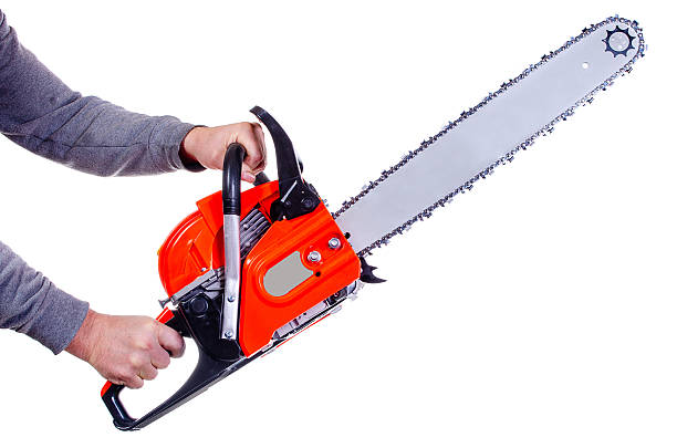 istock A man holds a chainsaw in his hands on a white background 2212414452