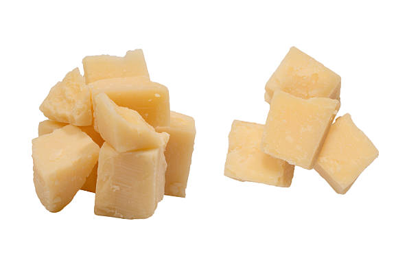istock Cheese cubes isolated on a white background. 2212416756