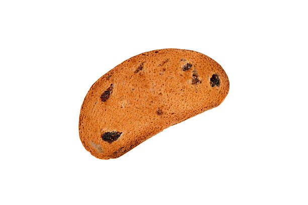 istock Isolated slice of bread with raisins 2212434178