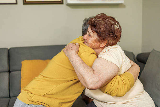 istock Senior Mother and Son Sharing a Tender Moment 2212434369