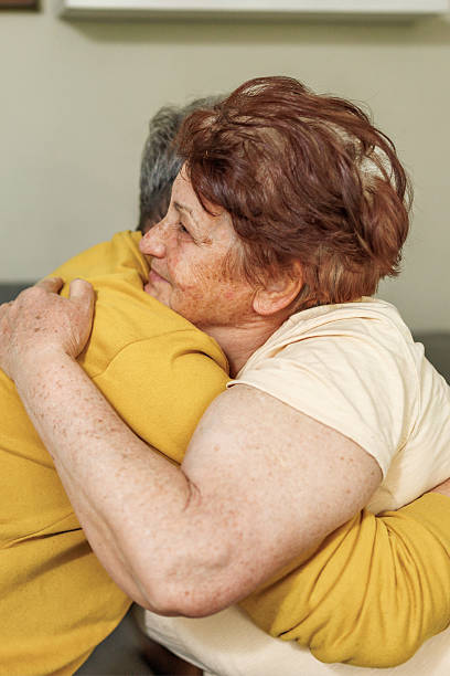 istock Senior Mother and Son Sharing a Tender Moment 2212434370