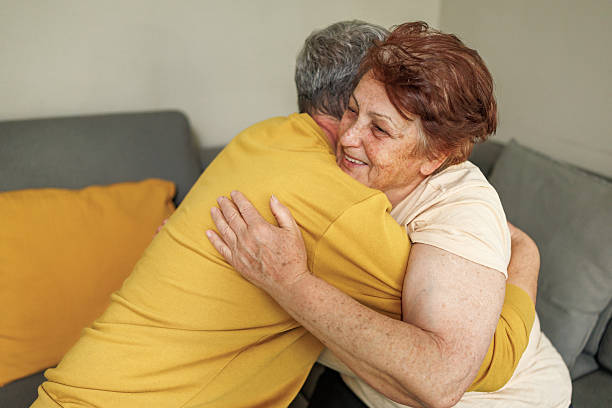 istock Mother and Grown Son Bonding Through a Warm Embrace 2212434614