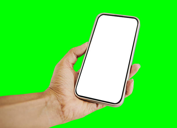 istock Hand Holding Smartphone With Blank White Screen Against Green Screen Background 2212434988