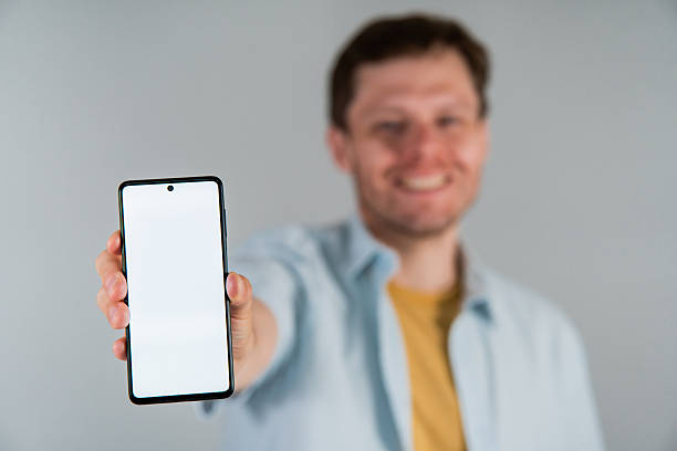 istock portrait of a man using a cell phone 2212436651