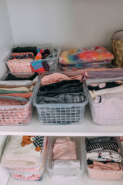 istock Perfect order, neatly arranged things in the closet. 2212440005