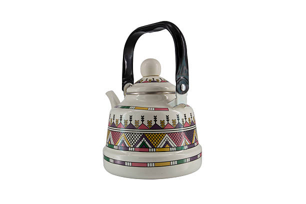 istock Vintage metal old kettle with patterns isolated on white background 2212448175