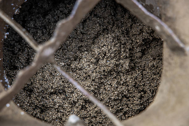 istock Close Up of Granular Metallic Particles in a Container with Metal Grate 2212448896