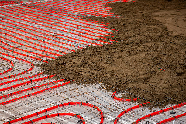 istock Underfloor Heating Pipes Installation with Estrich Concrete Layer 2212451362