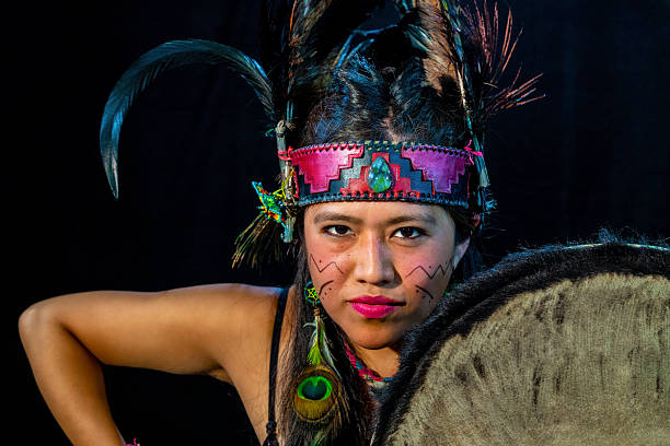 istock Mexican dancer performing pre-hispanic ritual with drum and feathers 2212452557