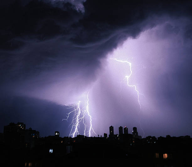 istock City Lights and Lightning Bolt 2212452567