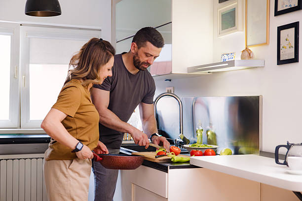 istock Couple cooking together 2212455982