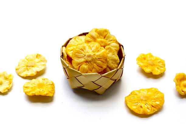 istock Sweet pineapple snack, Dried pineapples slices 2212456017