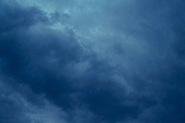 istock Dark cloudy sky before a thunderstorm. Bad weather. 2212460424