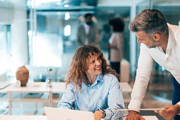 istock Business people discussing work in the office 2212460486