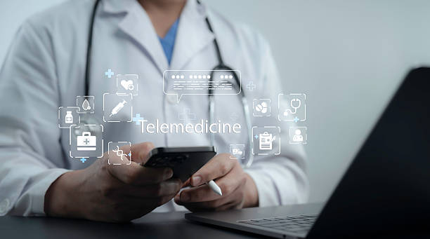 istock Doctor using smartphone and digital interface to perform a remote consultation, symbolizing telemedicine and AI-driven healthcare solutions. Smart digital health services, online patient care 2212469093