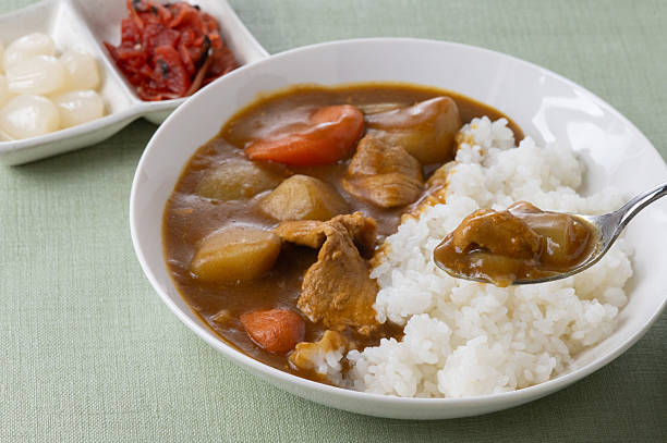 istock Japanese pork curry served on a white plate 2212471601