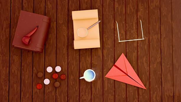 Top view of Father's Day themed objects on rustic wooden table including coffee mug, candies, book, pipe, glasses and red paper airplane