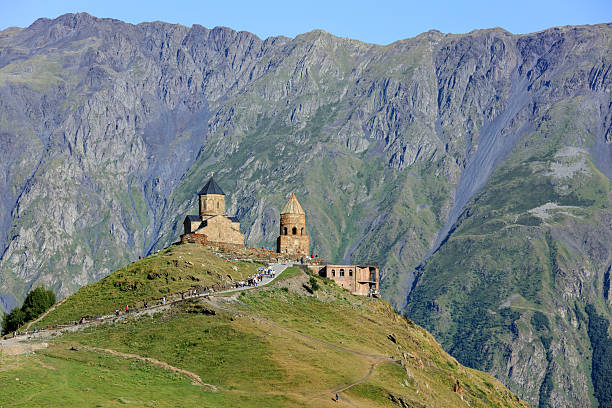 istock Gergeti Trinity Church, Stepantsminda, (Kazbegi), Georgia 2212472297