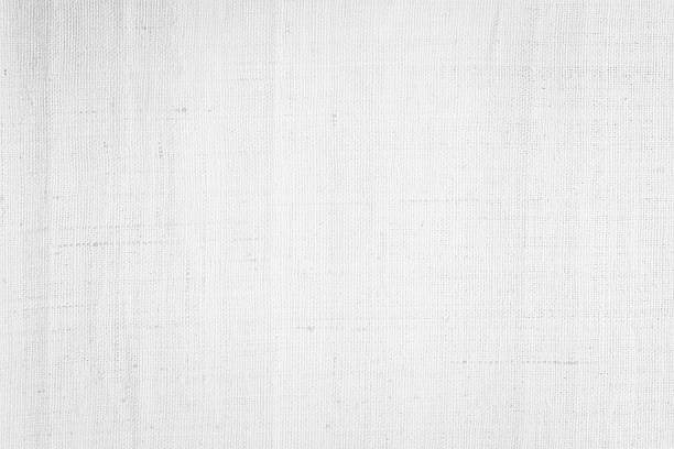 istock White color fabric canvas woven texture background in pattern light blank. Natural gauze linen, carpet wool and cotton cloth textile textured as clean empty for decoration text. Grey sack material. 2212474046