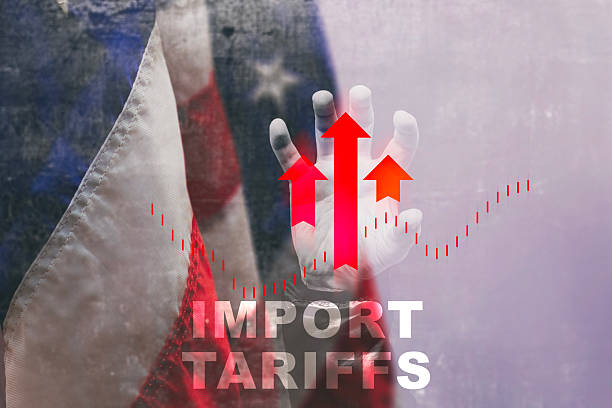 istock IMPORT TARIFFS over a US flag, a hand, and rising red arrows, symbolizing the economic effects of trade policies. 2212482275
