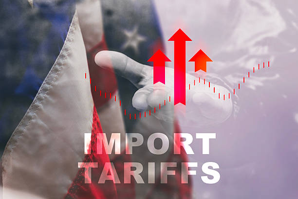 istock IMPORT TARIFFS over a US flag, a hand, and rising red arrows, symbolizing the economic effects of trade policies. 2212482286