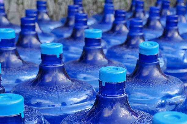 istock neatly arranged gallons of drinking water 2212490035