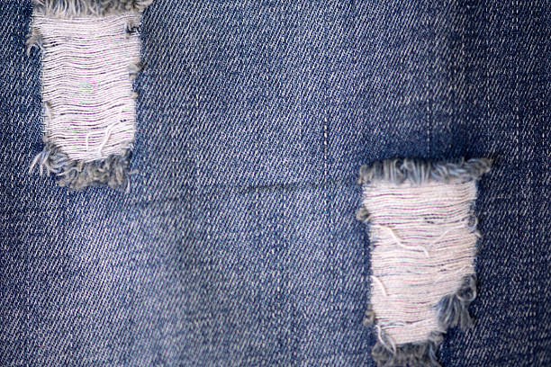 istock old blue jeans. denim jeans texture background 2212491507