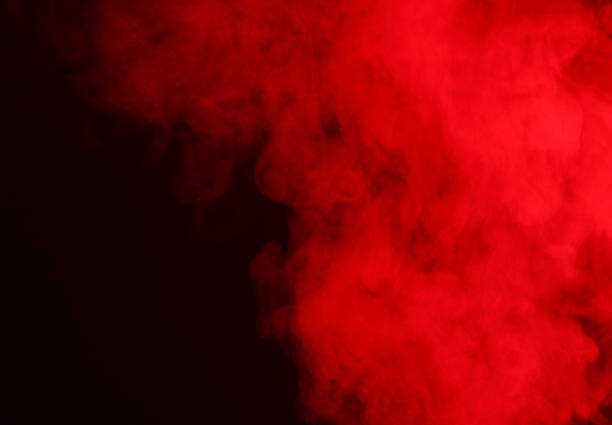 istock Steam or smoke in red neon light on black background 2212498297