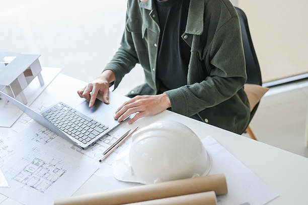 istock Architecture Man drawing on architectural Creative project business architecture building constructionÂ Industrial engineering Achievement Planning Design on laptop 2212498838