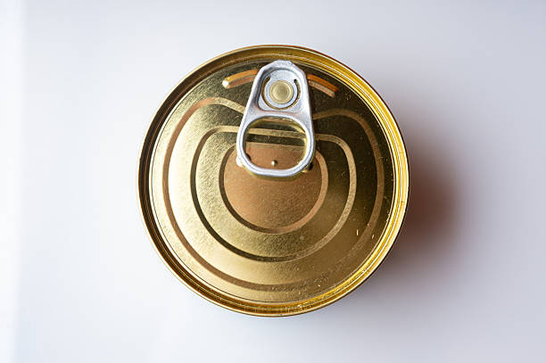 istock Round tin can with food on surface 2212502052