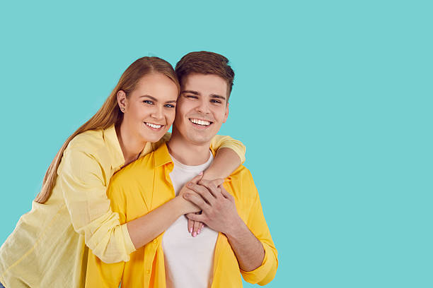 istock Smiling couple hug posing together 2212502638