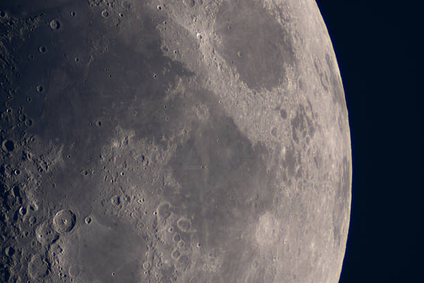 istock Detailed view of lunar surface featuring maria and craters. 2212502689