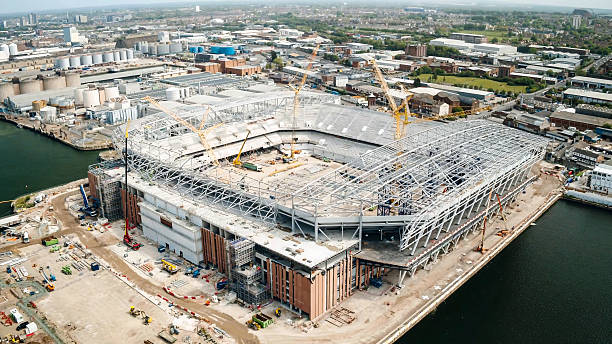 istock Construction process of a sports stadium with a metal roof 2212506200