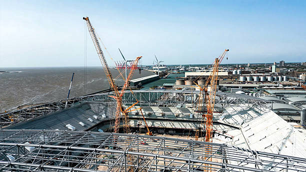 istock Construction process of a sports stadium with a metal roof 2212506201