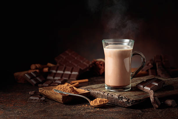 istock Creamy hot chocolate drink on a brown background. 2212507423