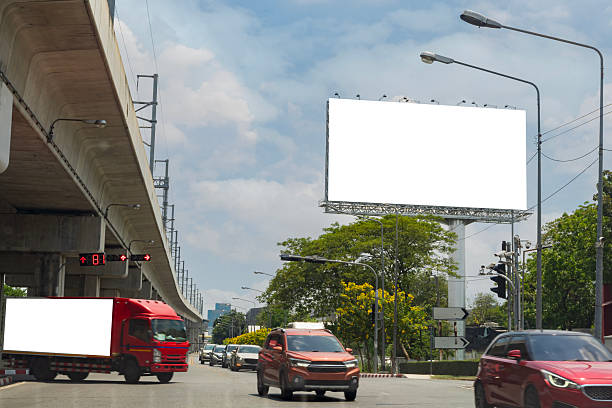 istock Trucks Logistic by Cargo truck on the road .empty white billboard .Blank space for text and images. 2212512776