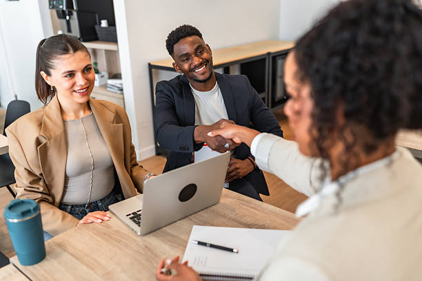 istock Managers shaking hands after successful job interview in modern office 2212513749