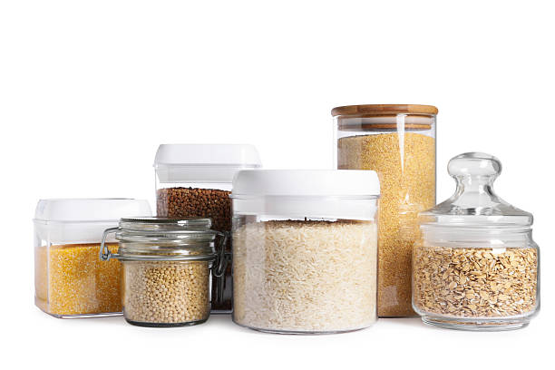 istock Different types of cereals in containers isolated on white 2212513775