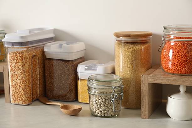 Shelf that tells stories of travels, each spice with its own Provenance marked on decorative labels with vintage typography