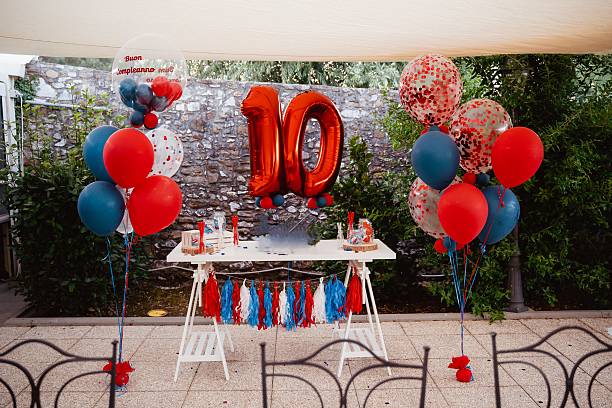 istock Colorful 10th Birthday Party Celebration Setup with Balloons 2212524111