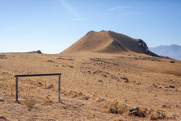 Salt lake and grassy hillside, Antelope Island State Park, Utah