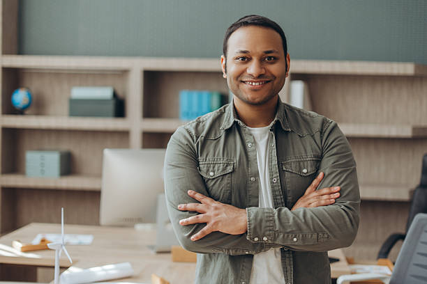 istock Confident engineer smiling with arms crossed in the office 2212527287