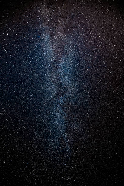 Background Night Starry Sky With Bright Stars And Meteoric Track Trail.