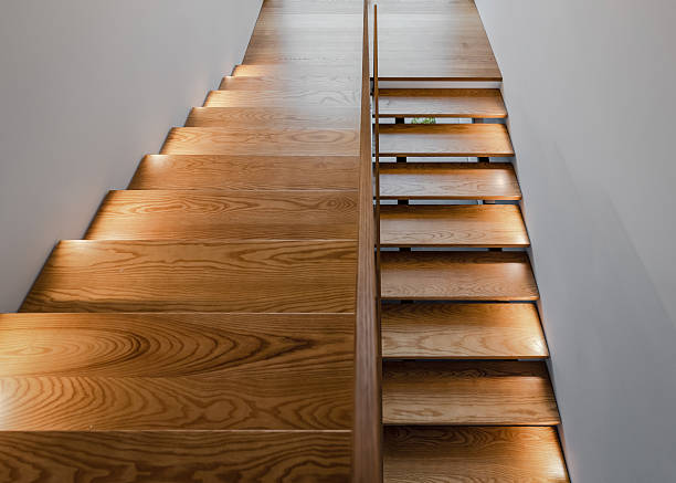 istock Wooden staircase in a building. 2212536005