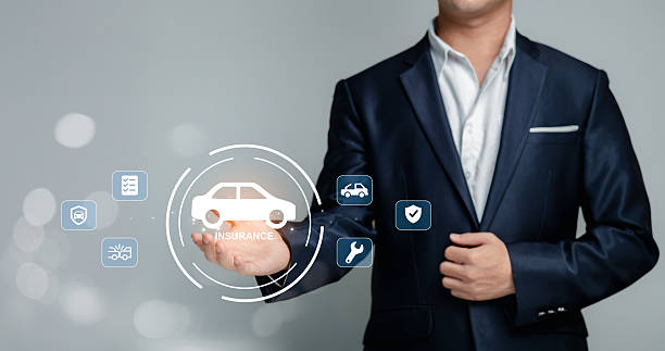 istock Professional Man in Suit Holding Car Insurance Concept Graphics 2212536944