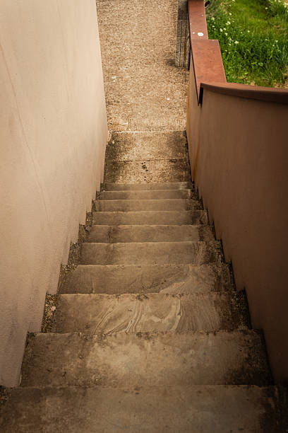 istock Steps leading into a serene garden area at dusk, inviting exploration and reflection in a peaceful setting 2212540108