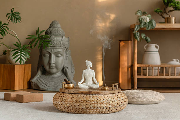 istock Meditation corner with incense smoke, natural decor, and earthy tones. A tranquil space for mindfulness practice. 2212541161