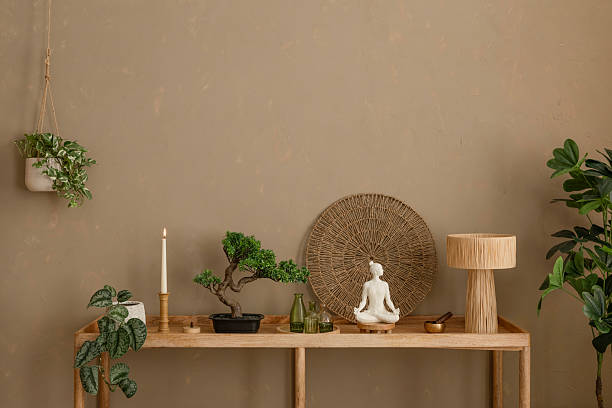 istock A warm and tranquil interior with woven accents, wooden elements, and a sculptural meditative figure as the focal point. 2212541214