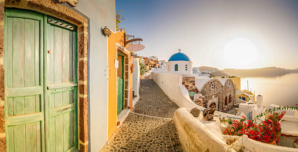 typical street of Oia, traditional greek village of Santorini, Greece, panorama
