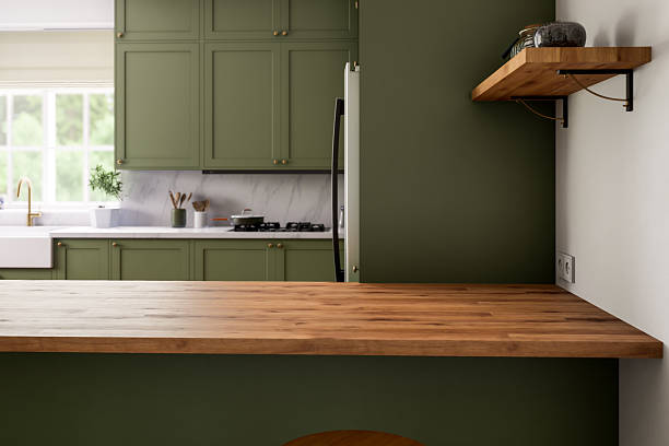 istock A modern green kitchen with a beautiful wooden countertop that is both stylish and functional 2212546183